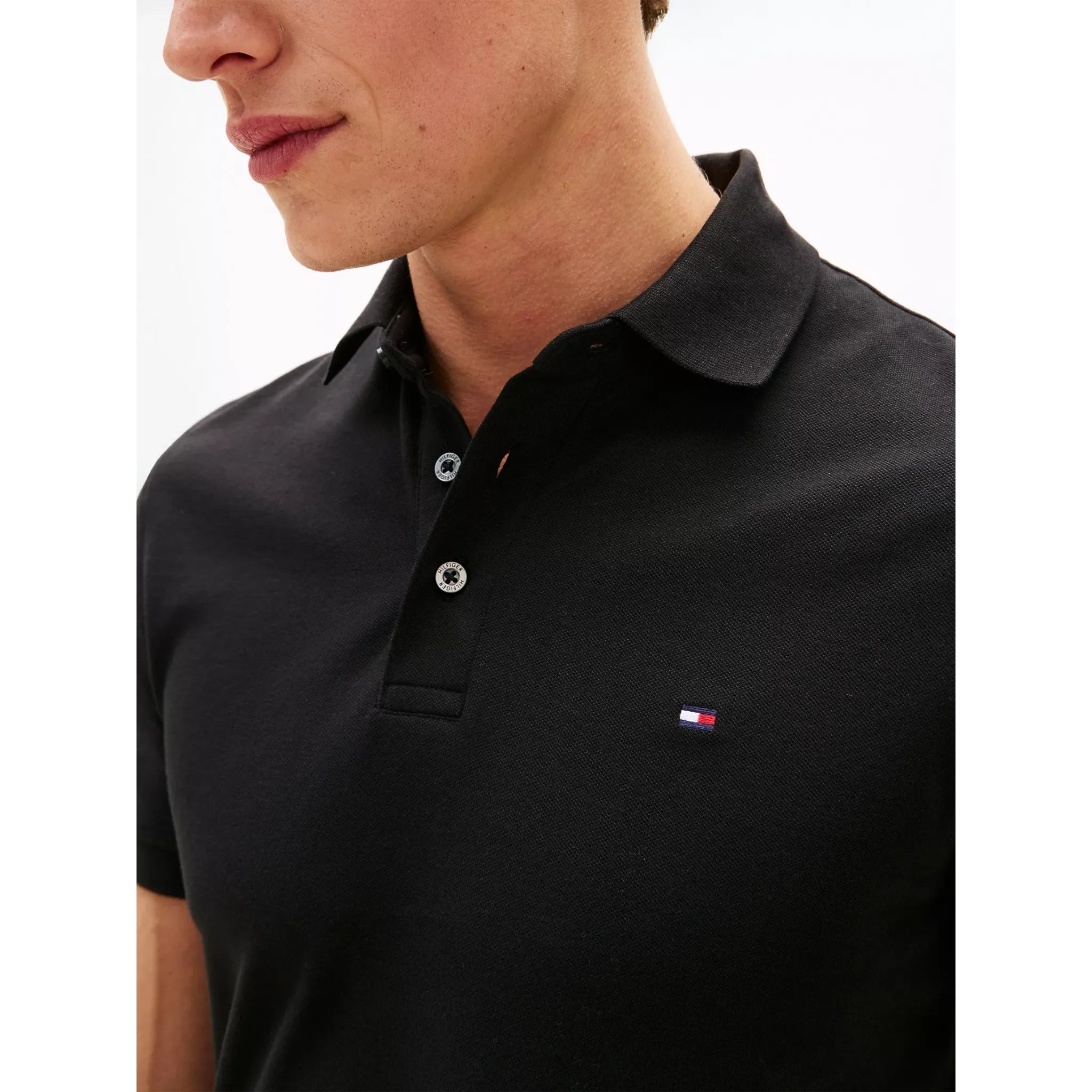 Polo de piqué elástico de corte ajustado PRODUCTO IMPORTADO